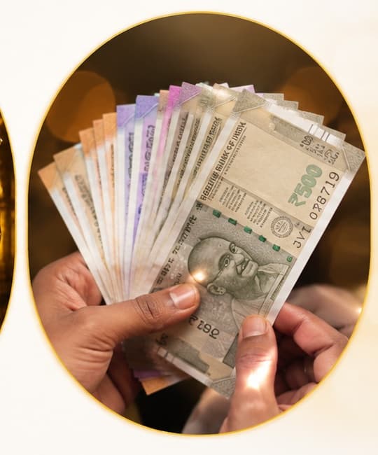 Indian rupee notes held in hands